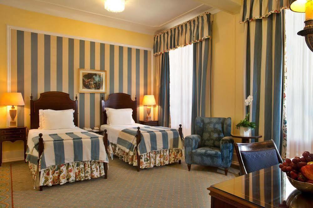 โรงแรมอเวนิดา พาเลซ ลิสบอน ภายนอก รูปภาพ A room at the hotel
